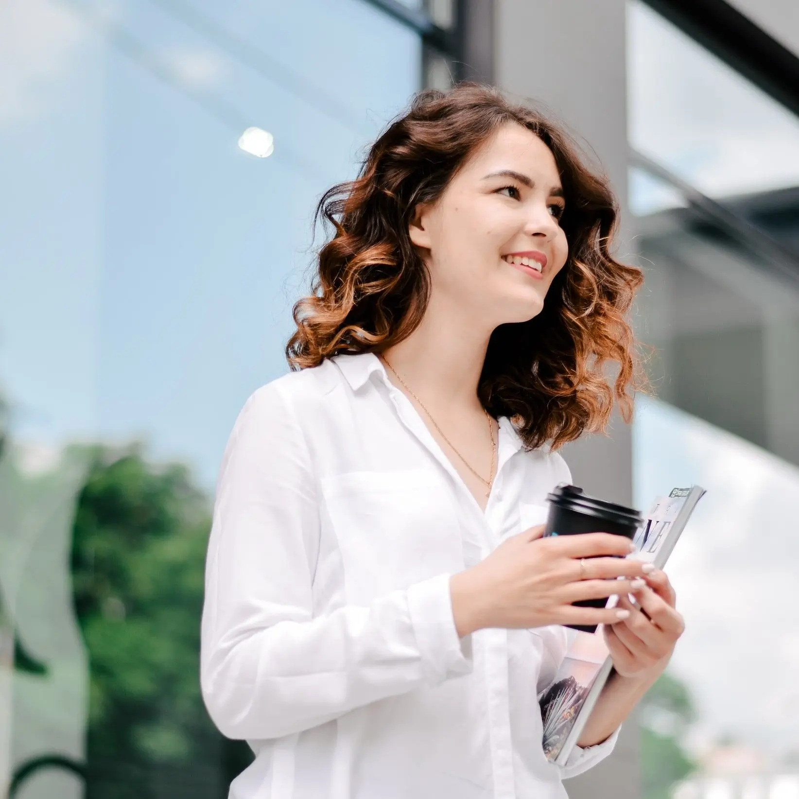 girl in white shirt holding plastic can. feedback stock market corses in palam